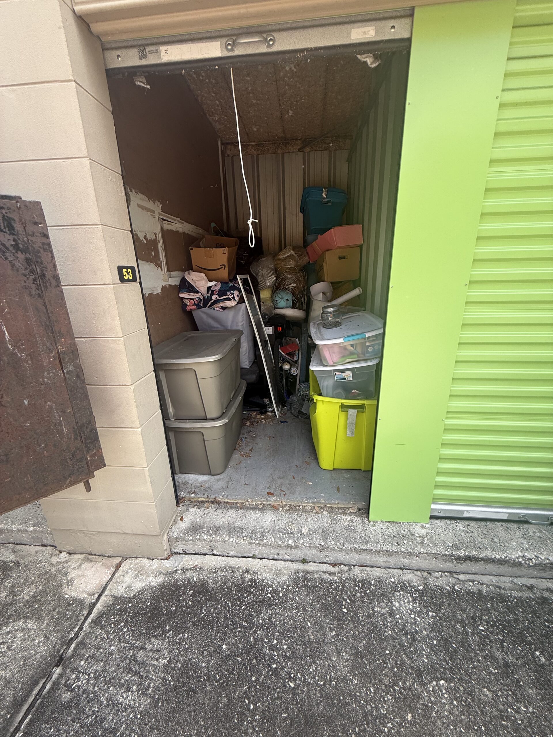 Crowded property area before clearing and organization