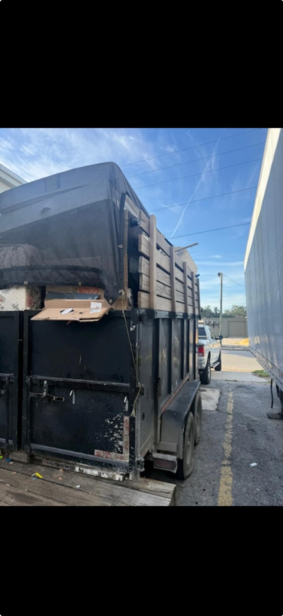 Trailer loaded with junk for removal