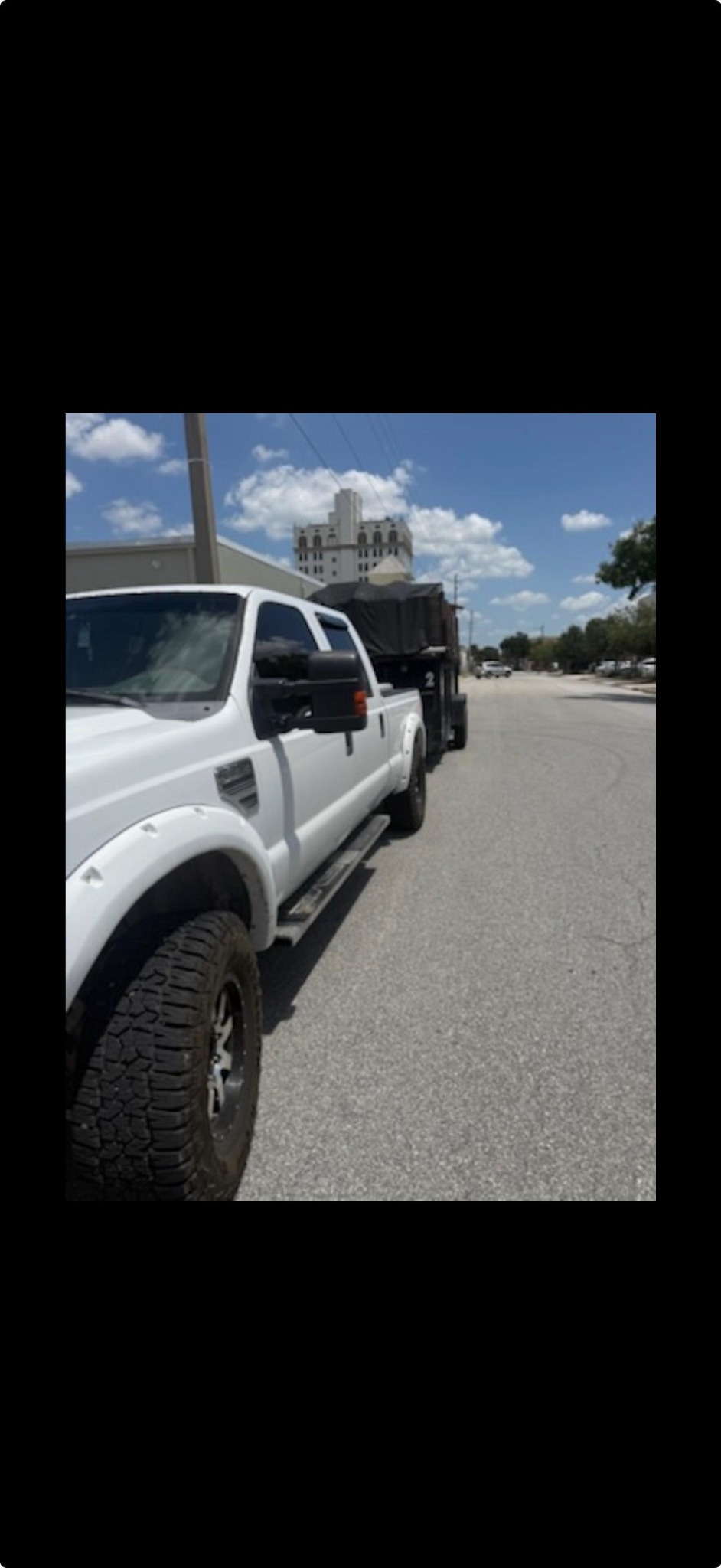 EZ Access Services junk removal truck on site